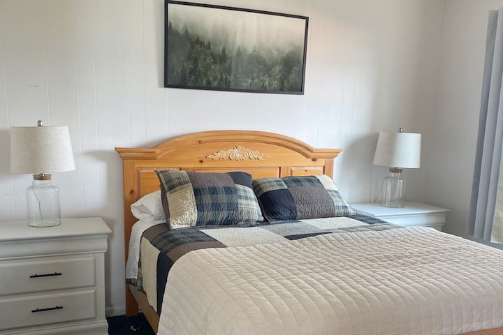 Newly refreshed bedroom includes, new bed, furniture and flooring. Enjoy this well lit and spacious room.