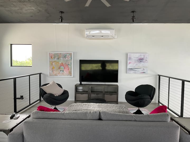 Upstairs separate TV room converts into a queen bedroom.