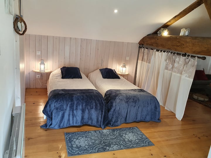 A mezzanine room with 2 beds of 80cm that can be separated, or brought together to form a single large bed of 160cm.