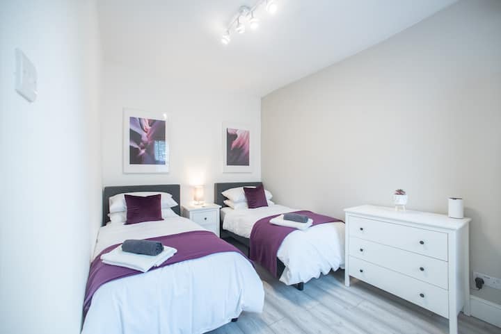 2 single beds, wardrobe with full length mirror