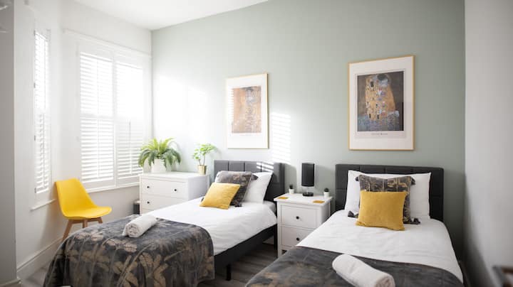 2 single beds, wardrobe with full length mirror