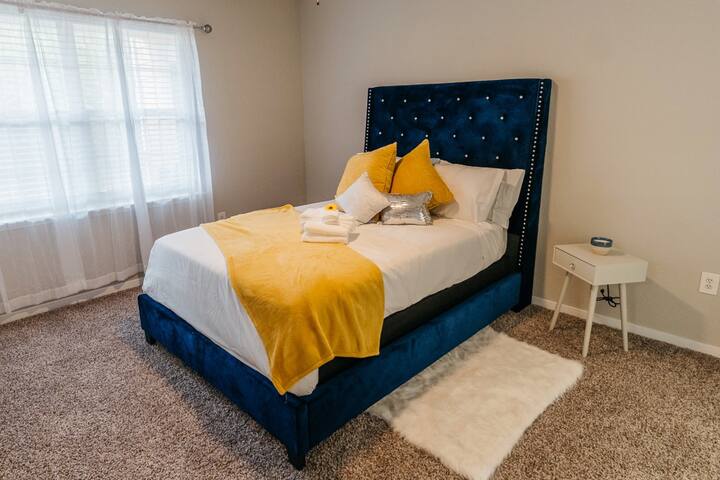 The Blue room with beautiful Tufted Head Board 