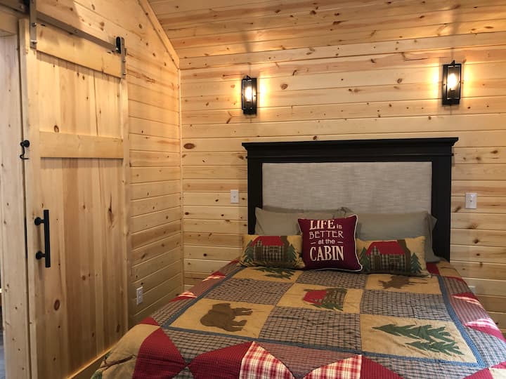 Queen size bed with barndoor and reading lights