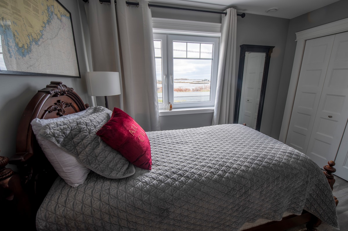 the Lighthouse Keeper's room has a view of Terence bay and the lobster boats