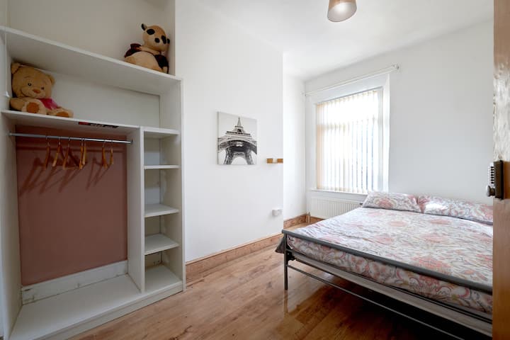 Bedroom 3, with a double bed, wardrobe, plenty of space and a lock on the door for privacy. 