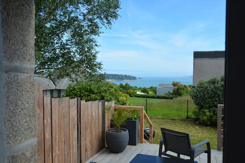 Sea view house with enclosed garden.