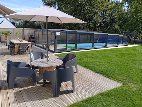 House with a swimming pool near the beach