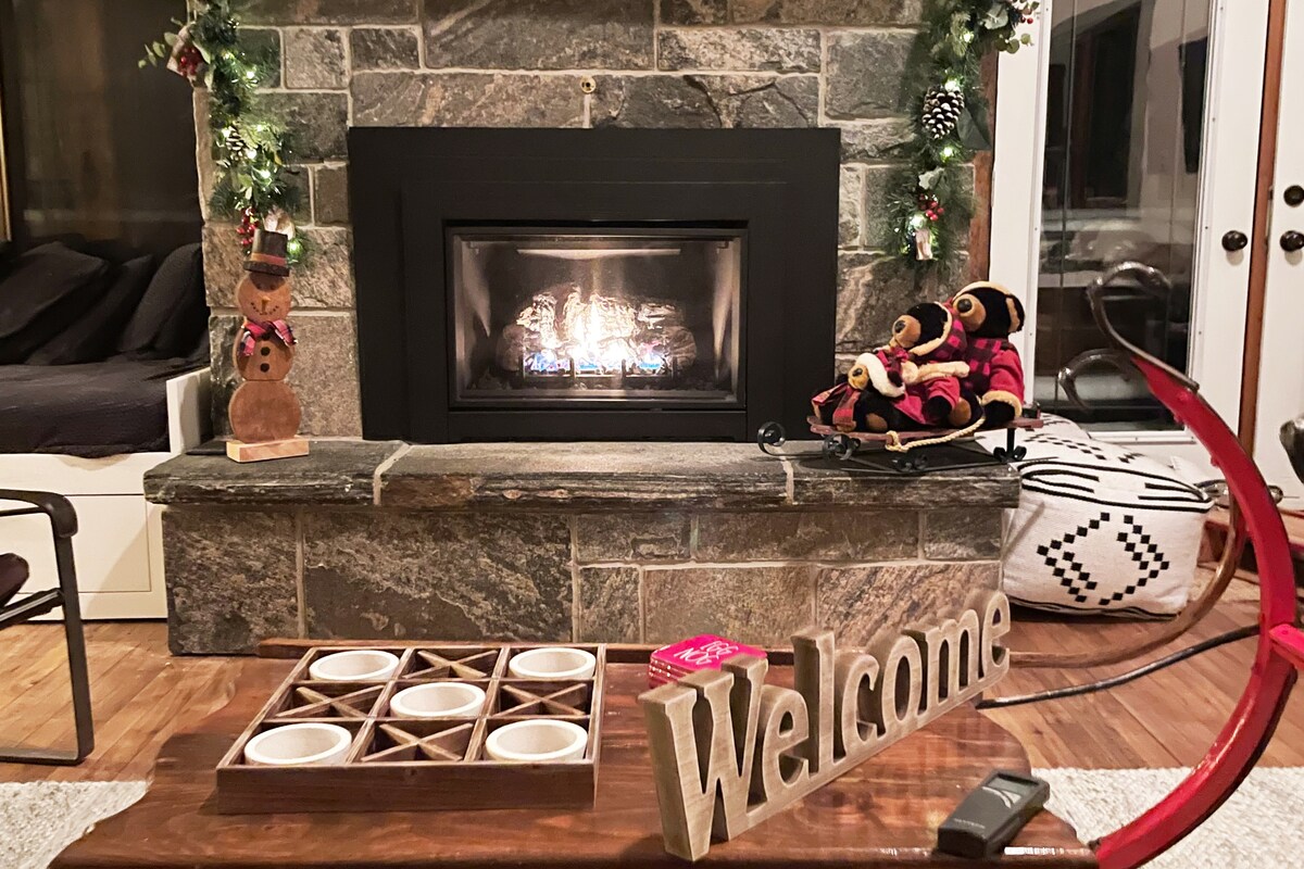 Fireplace on main level, propane stove in the basement.