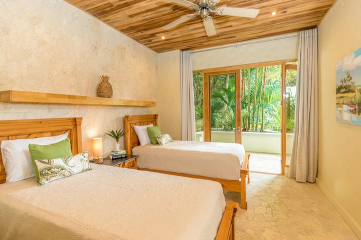Garden View Suite (Bedroom #4) with patio door, Two Twin beds (pictured) or converted King