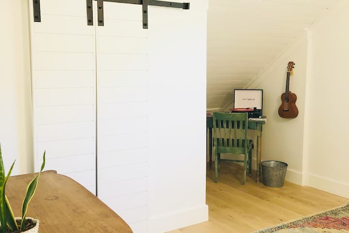 Nook in upstairs bedroom with queen bed.
