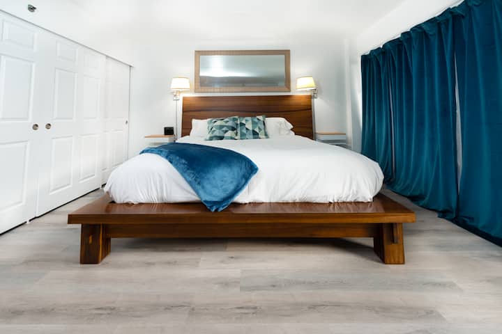 Comfortable king size bed with memory foam mattress! We use quality linens to make your sleep as enjoyable as possible. Black out curtains to help you sleep in!