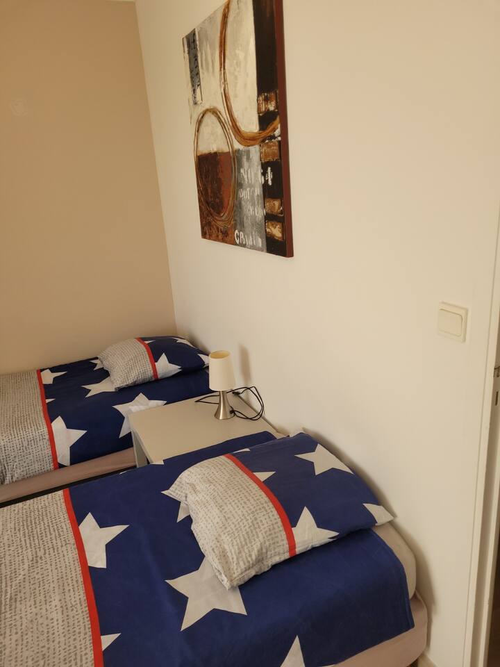 dormitorio 1 con 2 camas de una plaza