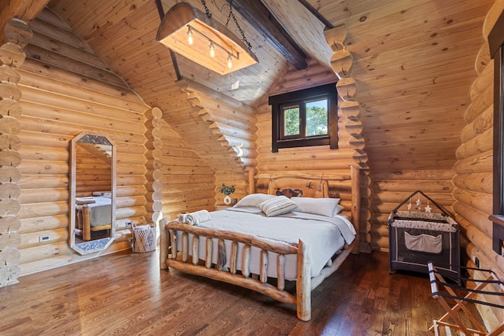 Comfortable Bedroom 1 with a king bed and a private bathroom for your convenience.