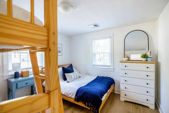 The second bedroom has a full sized bed and bunk beds.