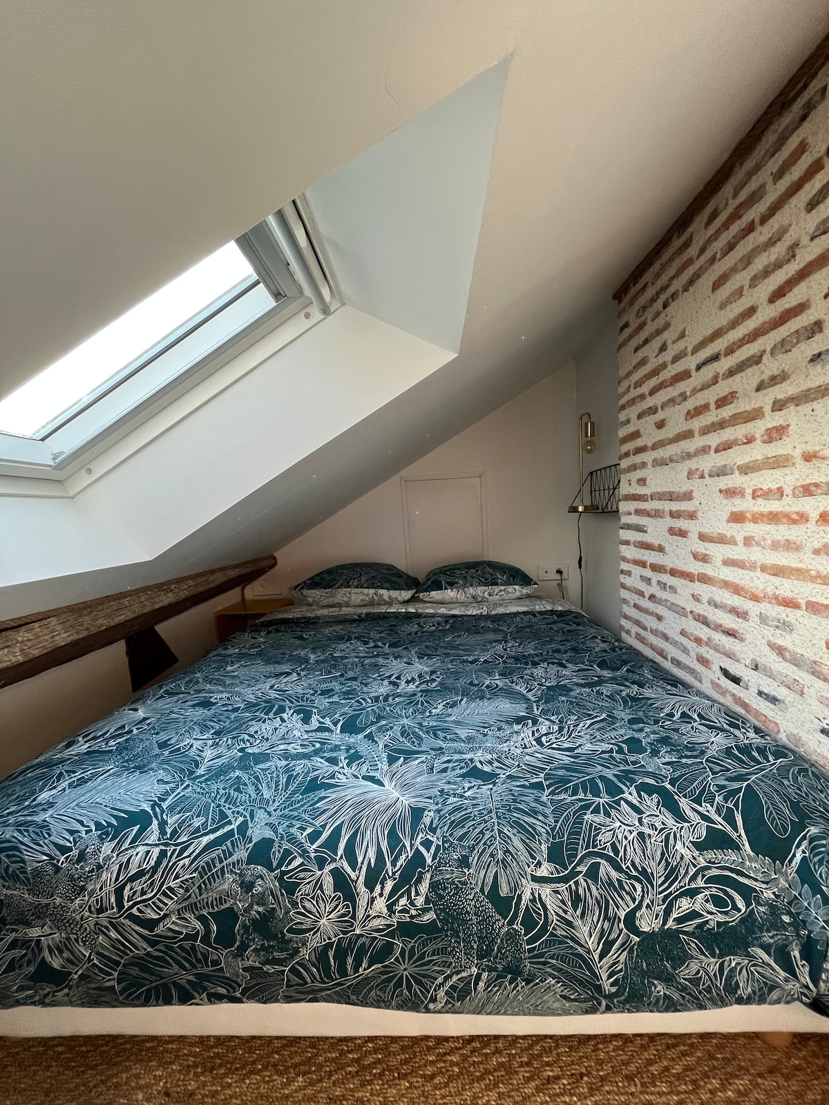 The bed is prepared for your stay and the towels provided