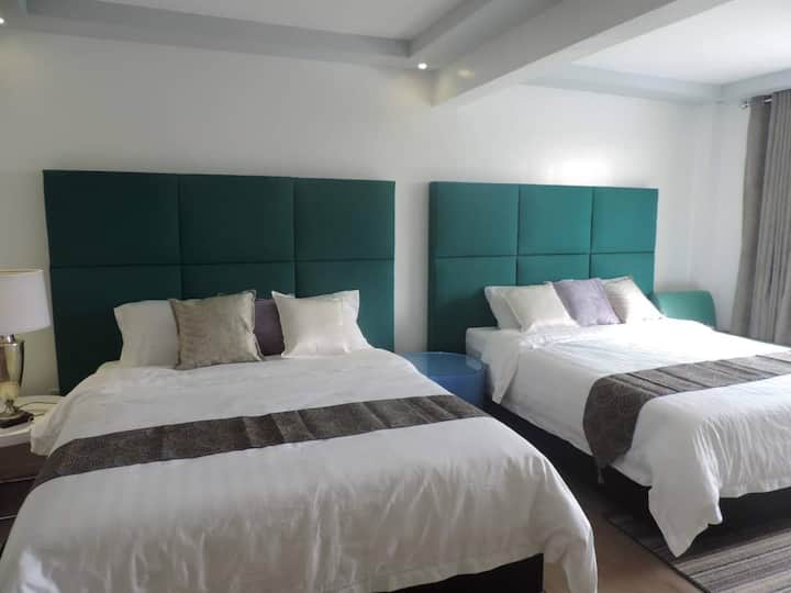 FAMILY ROOM

Two queen-sized bed, with one comfort room with one set of shower and heater, good for 4 pax per room