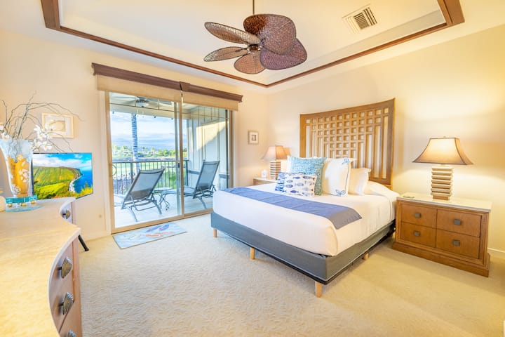 Hoofdslaapkamer met een kingsize bed