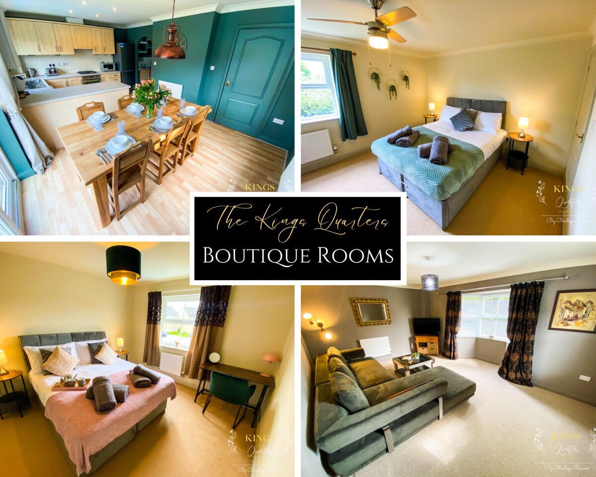 A collage showcases inviting boutique rooms at The Kings Quarters. The top-left image features a modern kitchen with dining space. The top-right depicts a well-decorated bedroom with a comfortable arrangement. The bottom images include another cozy bedroom and a welcoming living area with seating and a television.