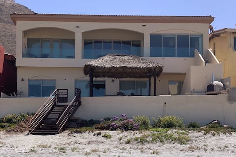 Beachfront home with panoramic ocean views.