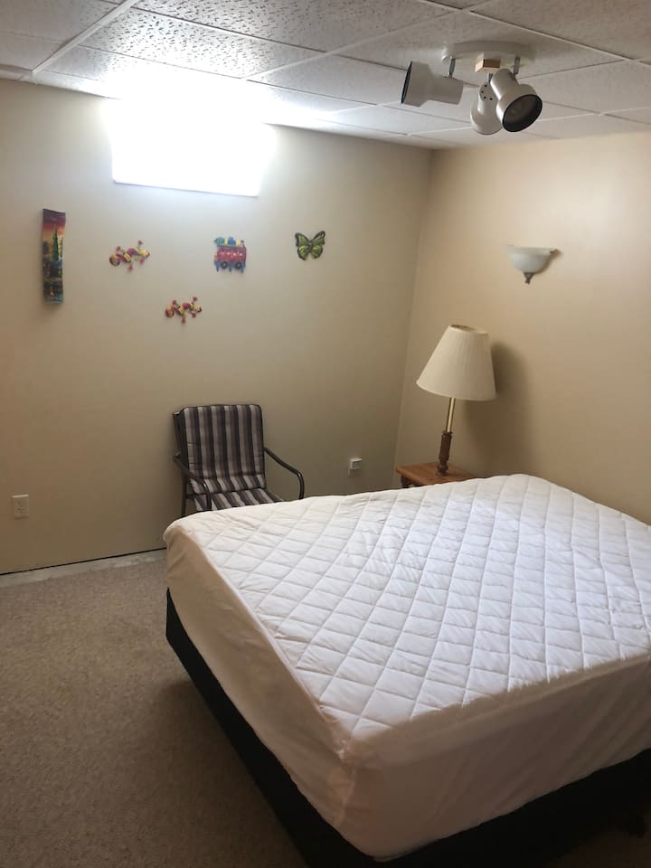 Lower level new (2020) queen bed, you will need to bring your own sheets and pillows