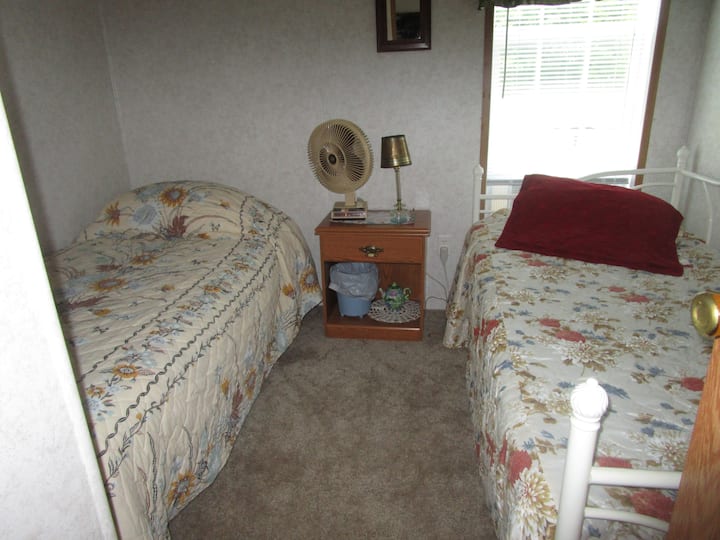 separate bedroom with 2 twin beds, also with air conditioner