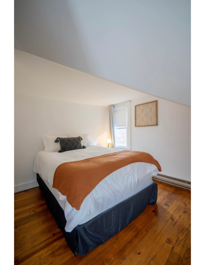 Bedroom 4 - Same layout as bedroom 1 *please notice slanted ceilings due to the historic architecture of the house*