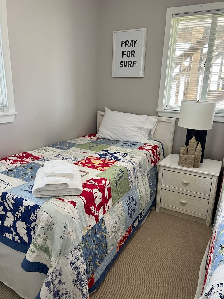 The fourth bedroom has two twin-size beds in it.