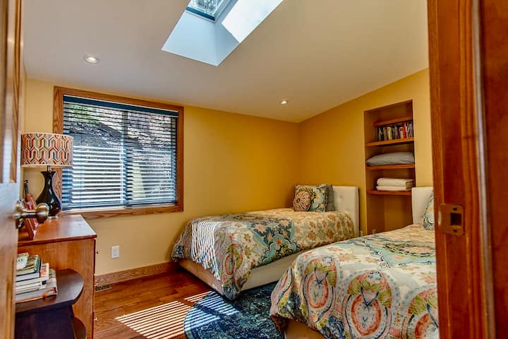 New 2024! Third bedroom (located upstairs near the living room and master bedroom) features two twin beds, dresser, skylight and window.
