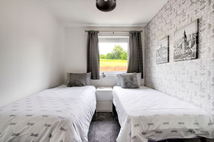 Twin room with both beds made up.  Please note that this is a trundle bed, so the bed on the right is a small single and the left hand bed a regular single.