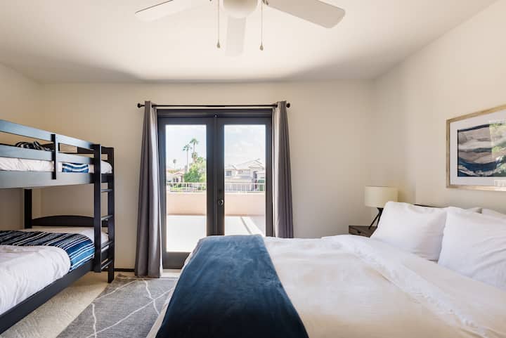 Upstairs bedroom #3. Sealy posturepedic queen mattress and twin bunk beds. Charging nightstands and roomy closet.  Shared deck and bathroom with next door bedroom #2. 