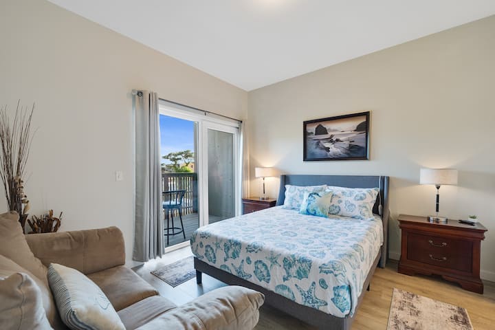Primary ensuite bedroom. Queen bed with high end memory foam. This room has it's own TV and private bathroom attached as well.