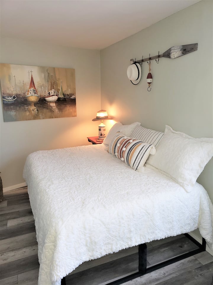 3rd Bedroom with Nautical Decor.  Brand New Full Size Bed with lots of pillows!
