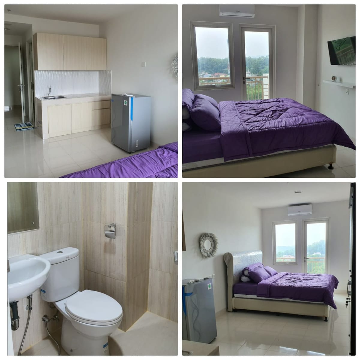 A modern sleeping area features a spacious bed covered with a purple blanket, placed beside large windows which allow natural light. A kitchenette is present with a refrigerator, and a clean bathroom is equipped with essential amenities and a white toilet.