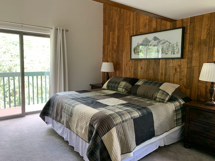 Large Master bedroom with king size bed, and optional working desk (not shown)