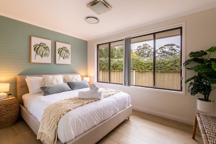 Master bedroom with Queen bed and built in robes. Ducted AC throughout