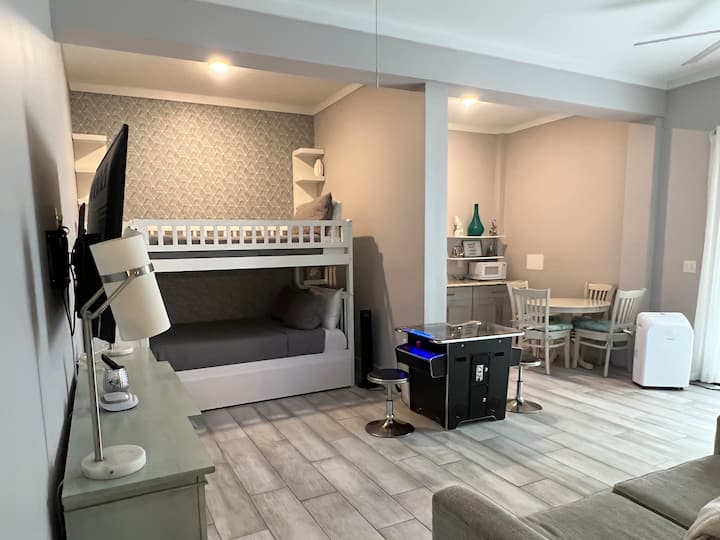 Lower level master bunk room with 410 game arcade and mini kitchen!