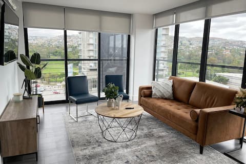 Luxury 2BR condo across TJ golf course 24 security