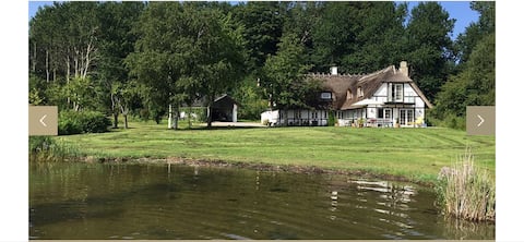 Luxury thatched roof villa 50 m on the fjord, 13500 sqm garden