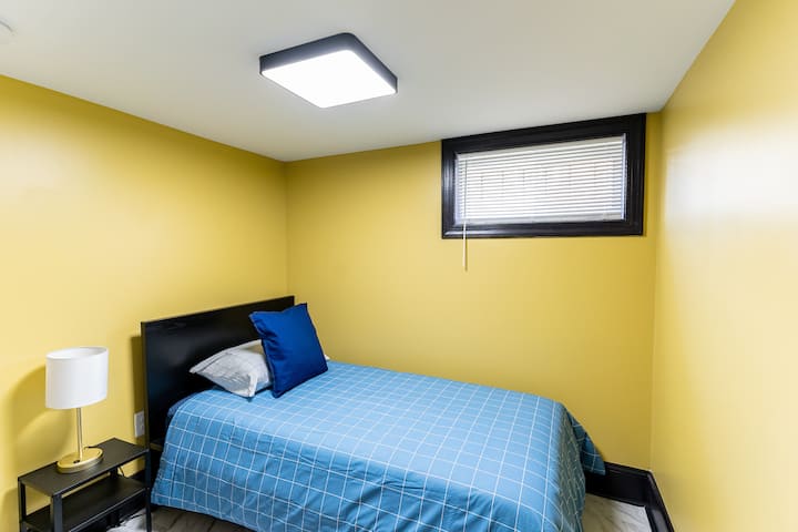 Bedroom 4 - equipped with 1 twin bed (sleeps 1 adult) and 50-inch Roku TV.