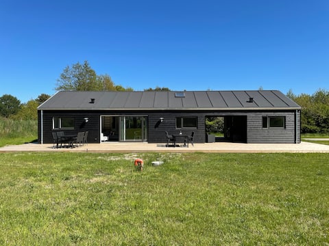 New quality summer house close to beach and golf course