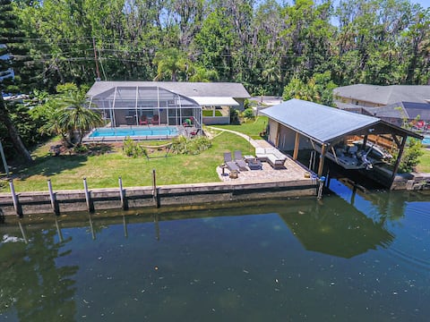 Waterfront retreat with heated pool and boat dock
