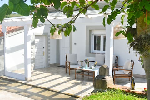 Detached house in Comillas with a private garden.