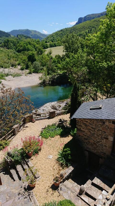 Stone house on the banks of the Tarn in Florac Cévennes