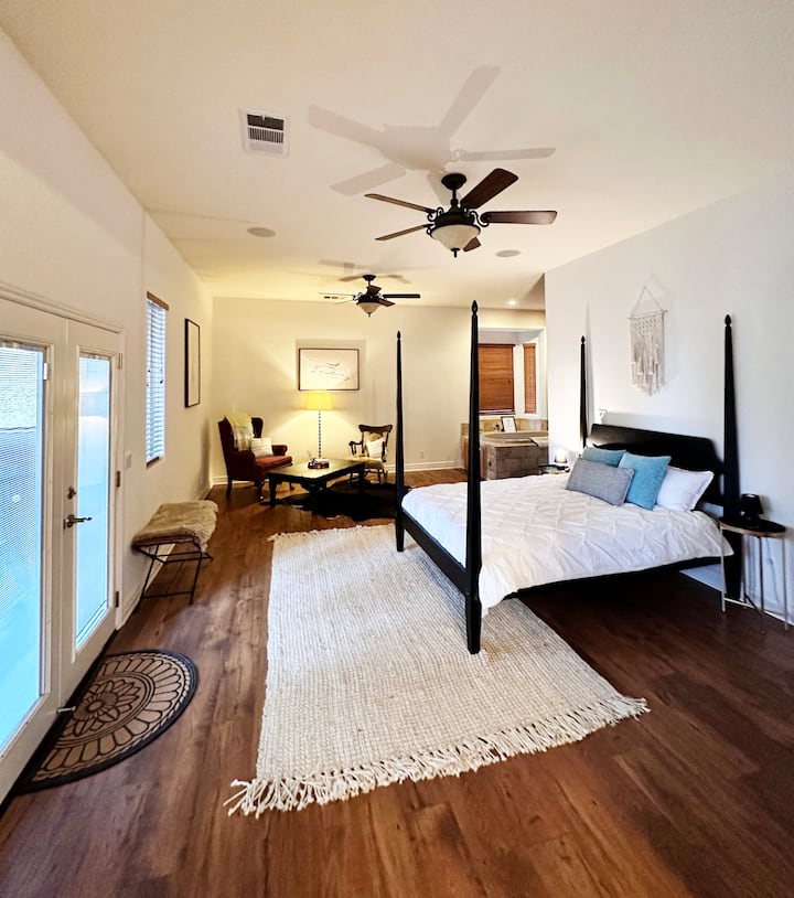 Spacious master bedroom with cozy sitting area, and wrap-around, attached master bedroom.