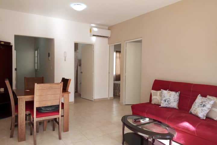 Large air-conditioned living room with a sofa bed