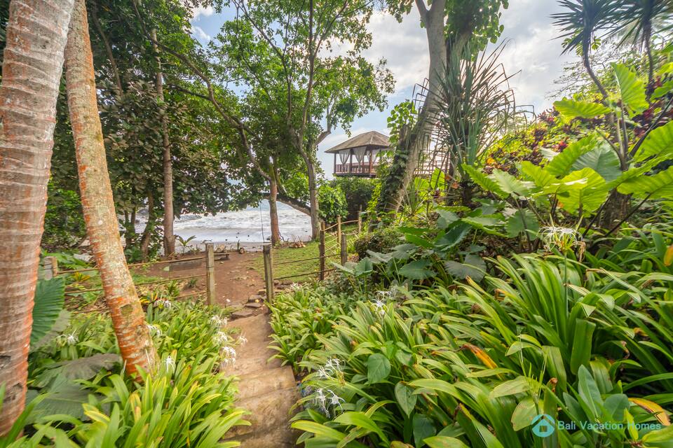 A Javanese joglo villa in a tropical fruit garden by the sea, Selemadeg, Tabanan, Bali, Indonesia, photo 1 of 10