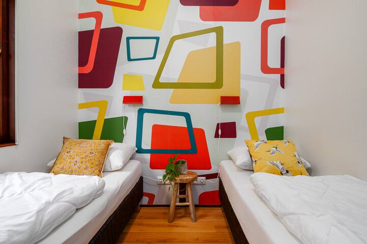 Comfortable 2 x single box spring for a wonderful night's sleep. Bedroom has one washbasin.