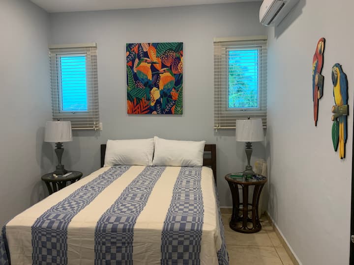 Mahi Mahi room: queen size and twin size beds with beach view