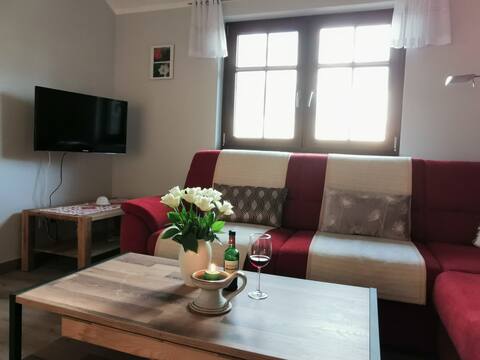 Erfolgreiche Airbnb-Immobilie: Clinker house with unobstructed view in Mönchgut