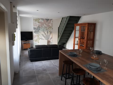 cottage nestled between river and canal